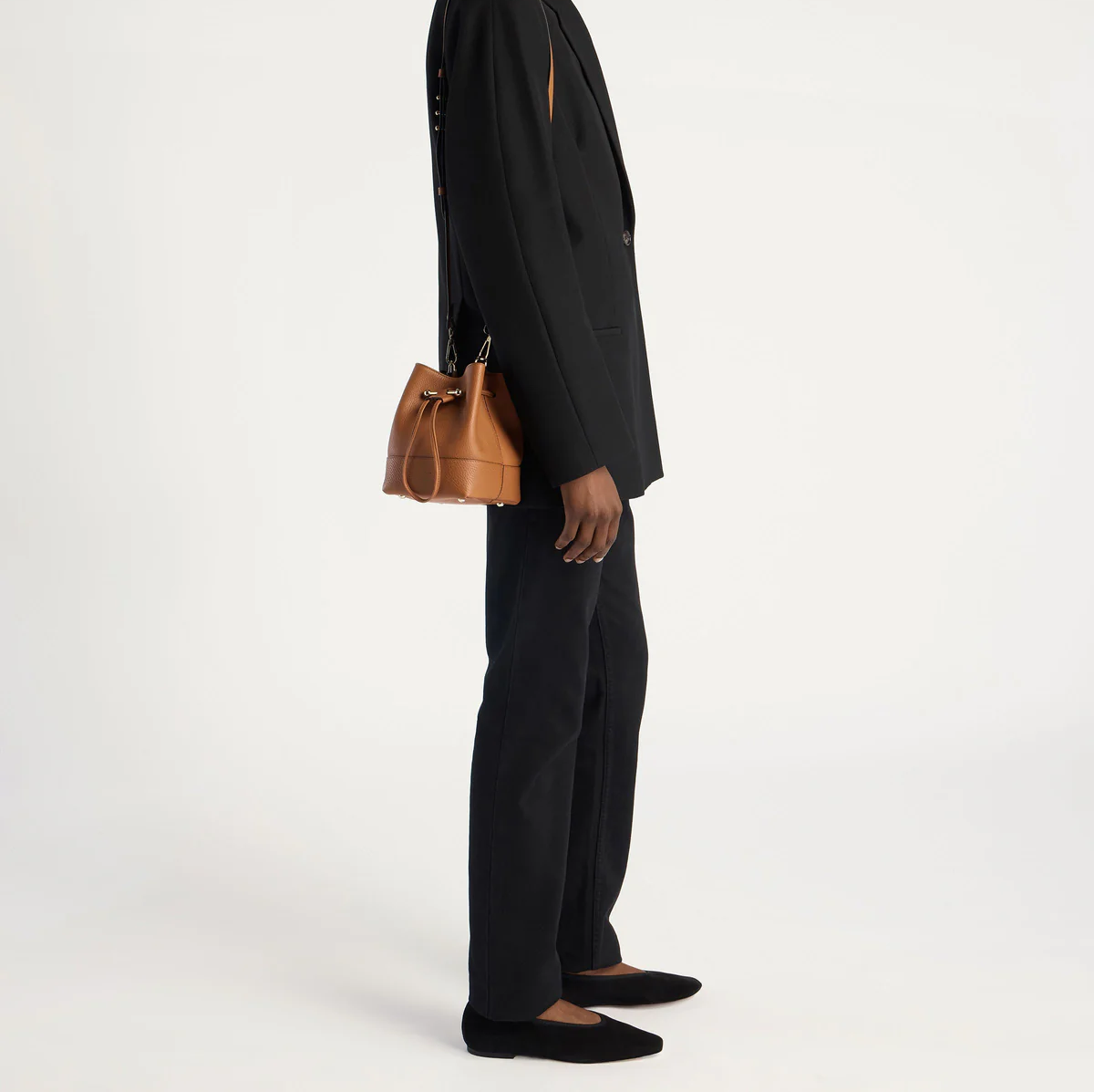 Tan Pebble Leather Bar Drawstring Mini Bucket Crossbody Bag
