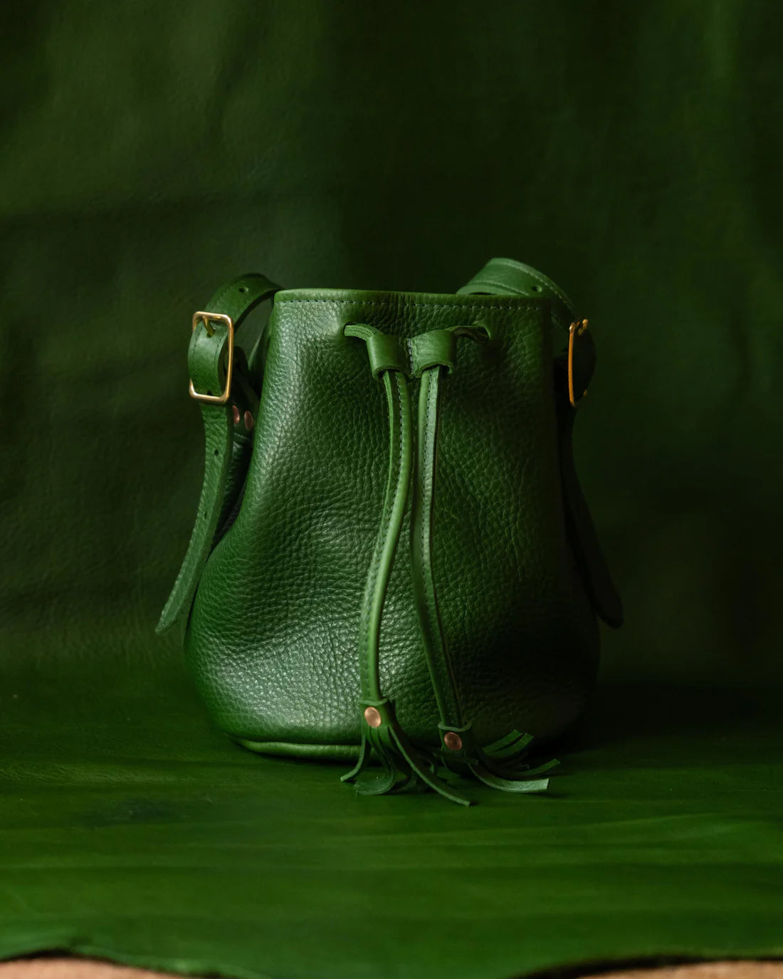 Pebble Leather Tassel Drawstring Adjustable Strap Mini Bucket Crossbody Bag